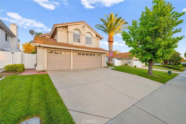 41024 Montelena Cir, Temecula, CA 92591 - view of front facade with concrete driveway, stucco siding, a tiled roof, and a garage