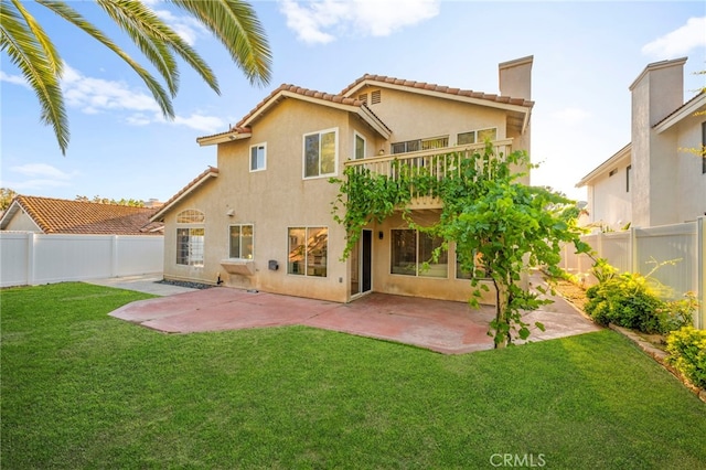 41024 Montelena Cir, Temecula, CA 92591 - rear view of property featuring a fenced backyard, stucco siding, a chimney, a tiled roof, and a patio