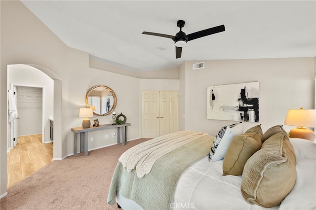 41024 Montelena Cir, Temecula, CA 92591 - carpeted bedroom with a closet, vaulted ceiling, and a ceiling fan
