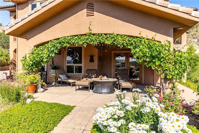 9942 Sunfish Cir, Paso Robles, CA 93446 - view of patio featuring an outdoor fire pit and french doors