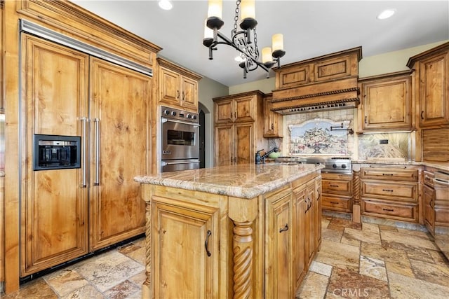9942 Sunfish Cir, Paso Robles, CA 93446 - kitchen with appliances with stainless steel finishes, stone tile flooring, tasteful backsplash, light stone counters, and recessed lighting