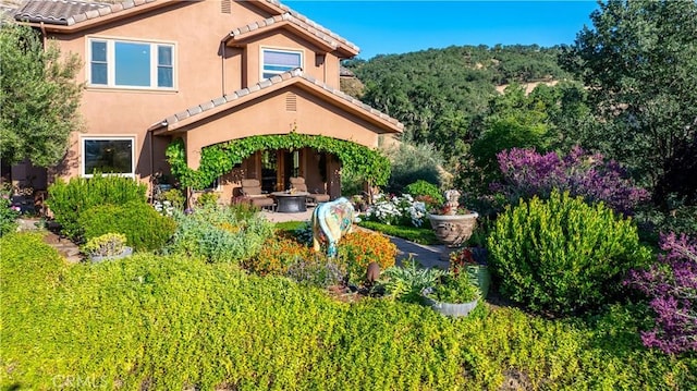 9942 Sunfish Cir, Paso Robles, CA 93446 - view of front of property featuring stucco siding and a tile roof