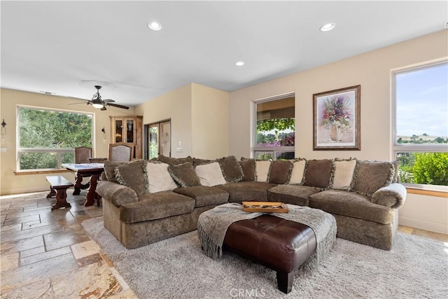 9942 Sunfish Cir, Paso Robles, CA 93446 - living room featuring stone tile floors, recessed lighting, and ceiling fan