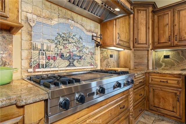 9942 Sunfish Cir, Paso Robles, CA 93446 - kitchen with stainless steel gas cooktop, backsplash, brown cabinets, and wall chimney range hood