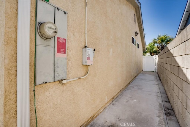 6772 Rook Dr, Huntington Beach, CA 92647 - view of side of home featuring stucco siding