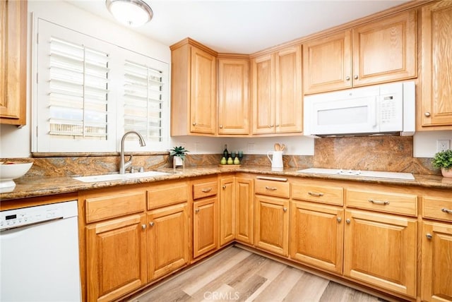 6772 Rook Dr, Huntington Beach, CA 92647 - kitchen with white appliances, light wood-style flooring, and light stone countertops