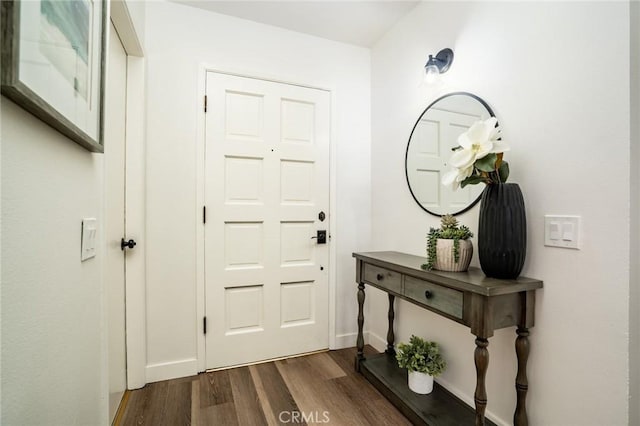6772 Rook Dr, Huntington Beach, CA 92647 - foyer entrance featuring dark wood-style flooring and baseboards