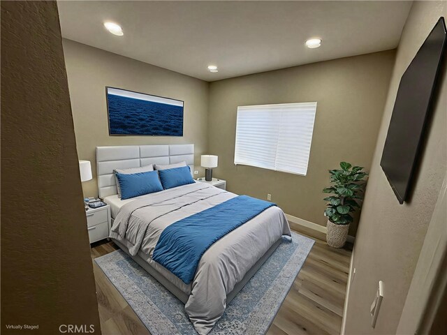 1540 Potrero Grande Dr Unit A, Rosemead, CA 91770 - bedroom featuring wood finished floors and recessed lighting