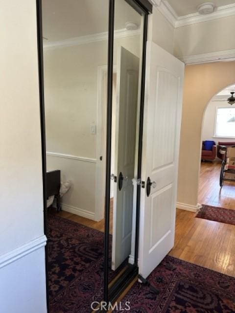 2322 249th St, Lomita, CA 90717 - hallway with wood finished floors, ornamental molding, and arched walkways