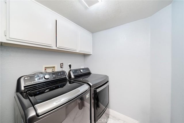 13555 Via, San Remo, Chino Hills, CA 91709 - laundry room featuring cabinet space, light marble finish floors, and washing machine and clothes dryer