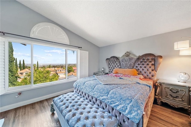 13555 Via, San Remo, Chino Hills, CA 91709 - bedroom featuring wood finished floors, lofted ceiling, multiple windows, and a textured ceiling