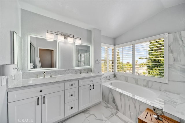 13555 Via, San Remo, Chino Hills, CA 91709 - bathroom featuring marble finish flooring, double vanity, lofted ceiling, and a garden tub