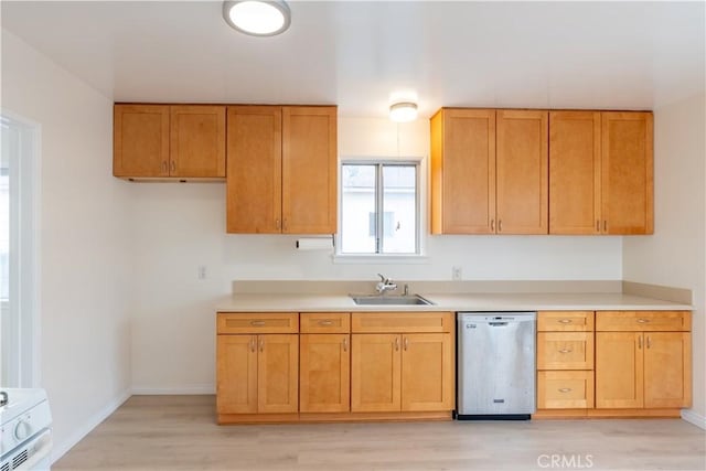 1534 W 154th Pl, Gardena, CA 90247 - kitchen featuring stainless steel dishwasher, light countertops, light wood-style flooring, brown cabinetry, and range