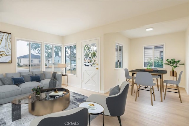 1534 W 154th Pl, Gardena, CA 90247 - living room featuring light wood-type flooring and healthy amount of natural light