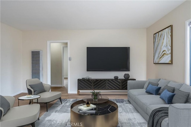 1534 W 154th Pl, Gardena, CA 90247 - living area with wood finished floors and a heating unit
