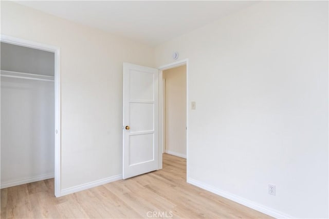 1534 W 154th Pl, Gardena, CA 90247 - unfurnished bedroom with light wood-type flooring and a closet