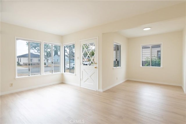 1534 W 154th Pl, Gardena, CA 90247 - unfurnished room with light wood finished floors and healthy amount of natural light