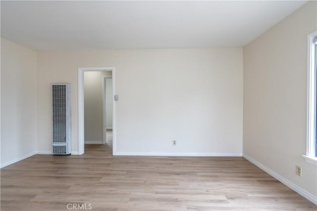 1534 W 154th Pl, Gardena, CA 90247 - spare room featuring a heating unit and light wood-type flooring