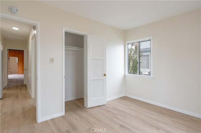 1534 W 154th Pl, Gardena, CA 90247 - unfurnished bedroom featuring light wood-style flooring and a closet