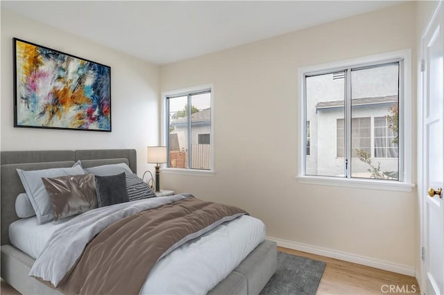 1534 W 154th Pl, Gardena, CA 90247 - bedroom with wood finished floors and baseboards