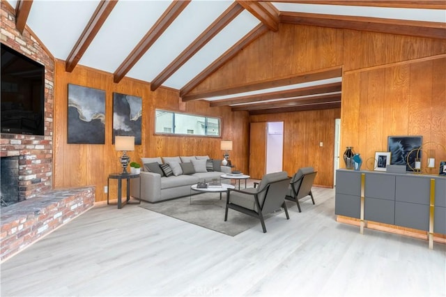1534 W 154th Pl, Gardena, CA 90247 - living room with a brick fireplace, beam ceiling, wood walls, wood finished floors, and high vaulted ceiling