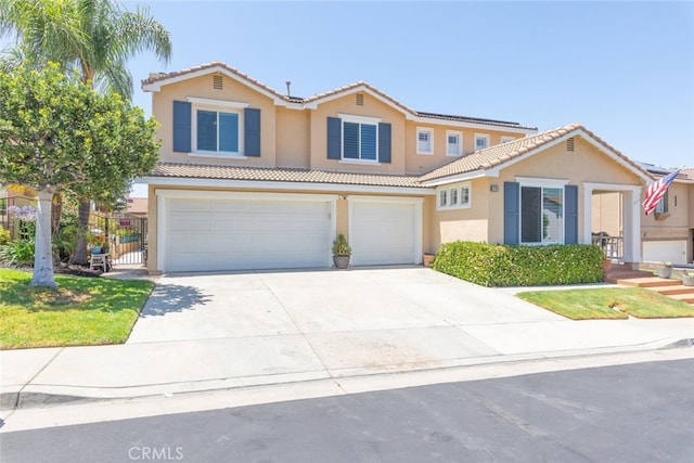 3720 Gunnison Cir, Corona, CA 92881 - view of front of property with a garage, stucco siding, driveway, and a tiled roof