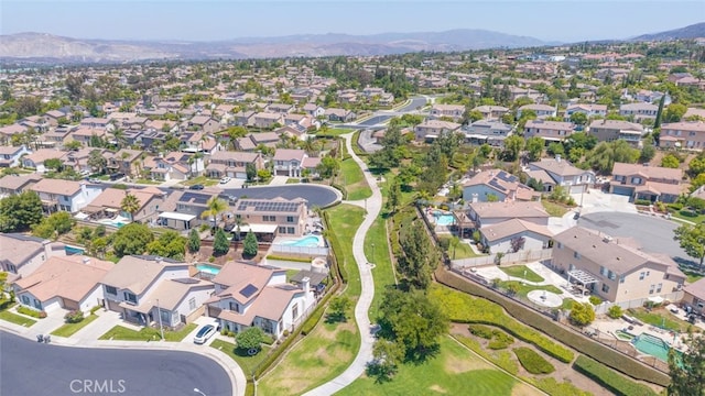 3720 Gunnison Cir, Corona, CA 92881 - aerial view of property and surrounding area with mountains and nearby suburban area