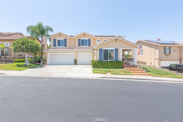 3720 Gunnison Cir, Corona, CA 92881 - view of front of home featuring a garage, roof mounted solar panels, concrete driveway, stucco siding, and a tile roof