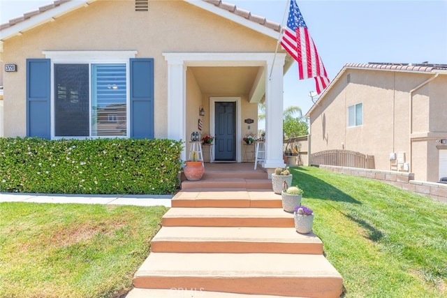 3720 Gunnison Cir, Corona, CA 92881 - view of front facade with stucco siding, a front yard, and a tiled roof