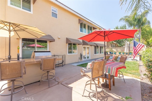 3720 Gunnison Cir, Corona, CA 92881 - view of patio with french doors, an outdoor bar, and exterior kitchen
