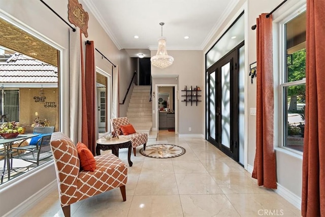 2335 N San Antonio Ave, Upland, CA 91784 - foyer entrance with crown molding, a chandelier, recessed lighting, and french doors