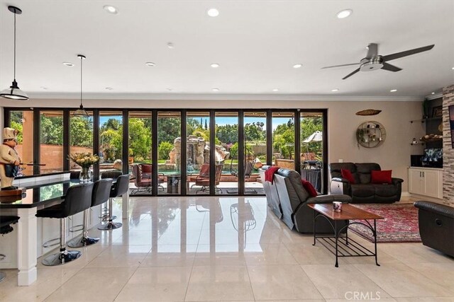 2335 N San Antonio Ave, Upland, CA 91784 - living area with plenty of natural light, crown molding, a ceiling fan, recessed lighting, and light tile patterned flooring