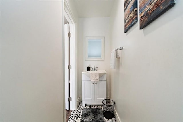 2335 N San Antonio Ave, Upland, CA 91784 - hallway with a sink and baseboards