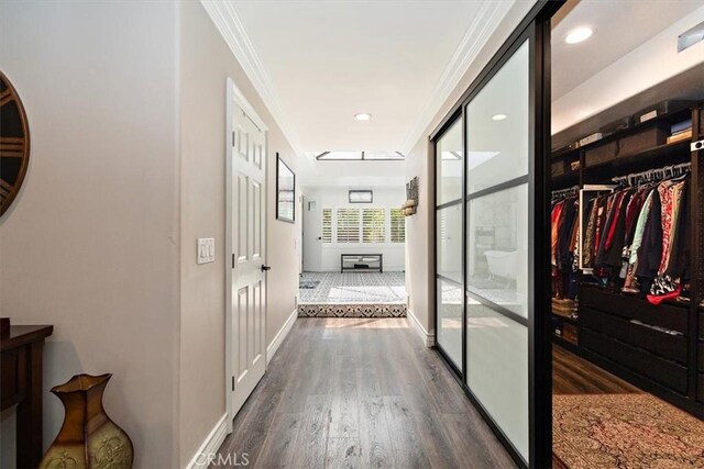 2335 N San Antonio Ave, Upland, CA 91784 - corridor featuring dark wood-type flooring, crown molding, and recessed lighting