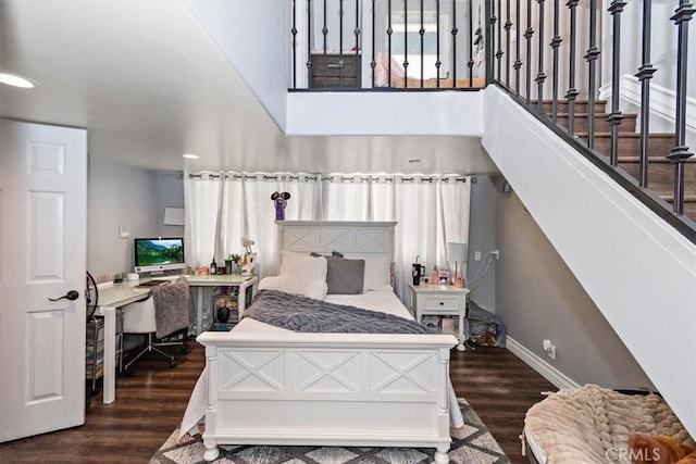 2335 N San Antonio Ave, Upland, CA 91784 - bedroom featuring dark wood finished floors, a desk, and a towering ceiling