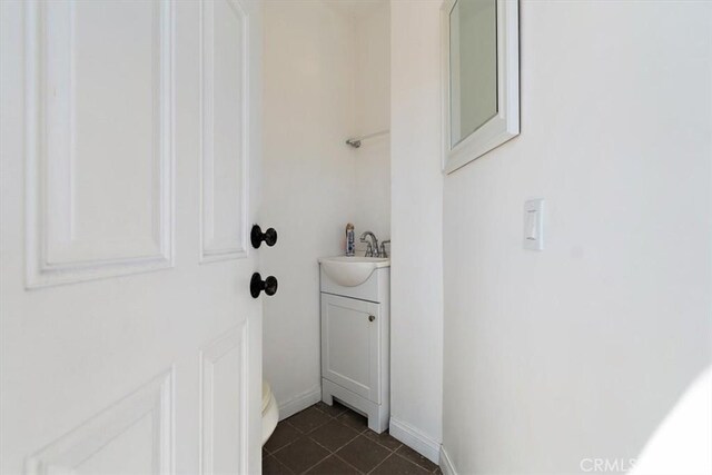 2335 N San Antonio Ave, Upland, CA 91784 - bathroom with vanity and tile patterned flooring