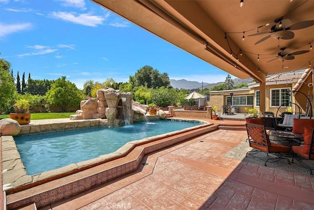 2335 N San Antonio Ave, Upland, CA 91784 - swimming pool featuring a mountain view, a patio area, and a ceiling fan