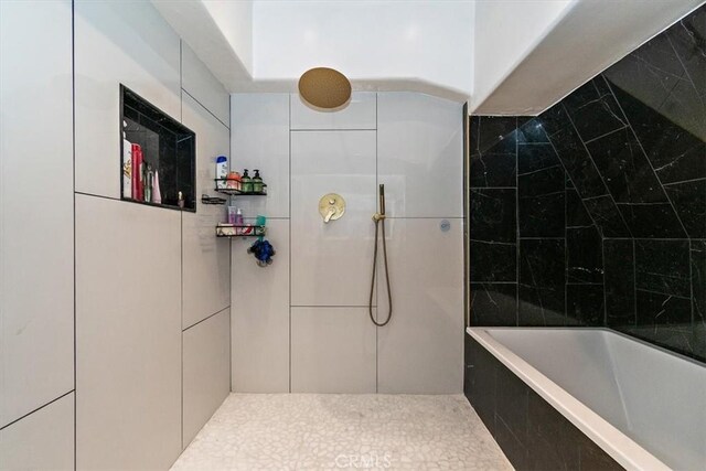 2335 N San Antonio Ave, Upland, CA 91784 - full bathroom featuring a tile shower and a tub