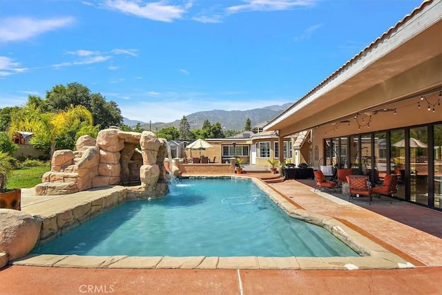2335 N San Antonio Ave, Upland, CA 91784 - outdoor pool with a mountain view and a patio area