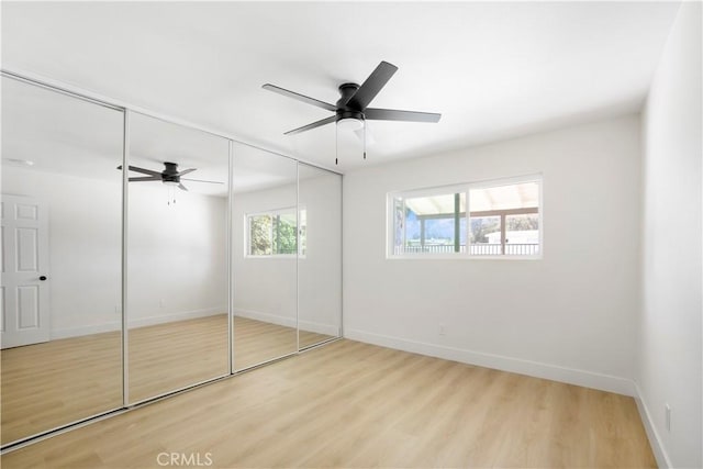 801 Navajo Dr, Riverside, CA 92507 - unfurnished bedroom featuring wood finished floors, a closet, and ceiling fan