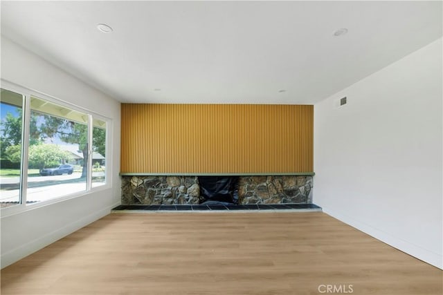 801 Navajo Dr, Riverside, CA 92507 - unfurnished living room with wood finished floors and a fireplace