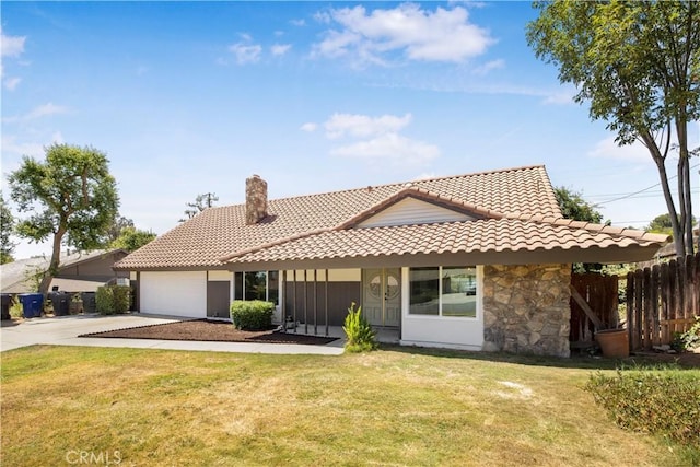 801 Navajo Dr, Riverside, CA 92507 - view of front of home with a tile roof, driveway, a chimney, and a garage