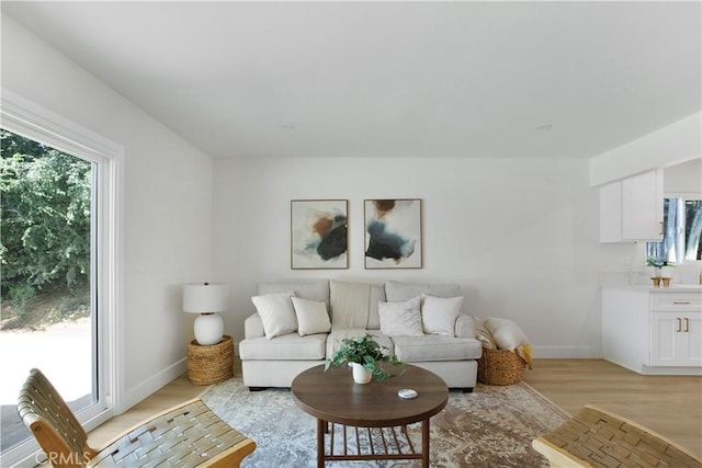 801 Navajo Dr, Riverside, CA 92507 - living area with baseboards and light wood-type flooring