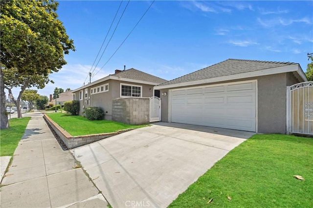 1425 Violeta Dr, Alhambra, CA 91801 - view of front facade with a gate, stucco siding, and driveway