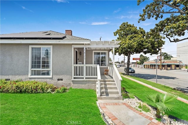 1425 Violeta Dr, Alhambra, CA 91801 - view of front of property with solar panels, a porch, a front lawn, a chimney, and stucco siding