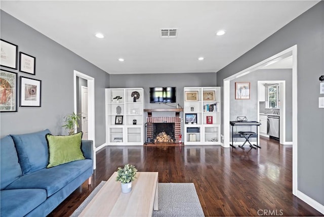 1425 Violeta Dr, Alhambra, CA 91801 - living room with wood finished floors, a brick fireplace, and recessed lighting