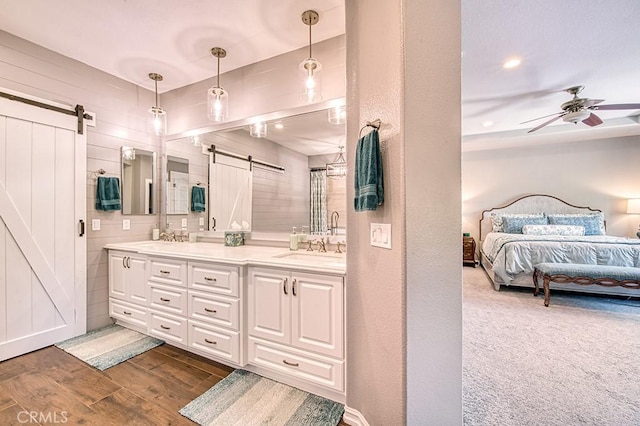 5 Kennedy Ct, Coto De Caza, CA 92679 - bathroom featuring ensuite bathroom, double vanity, a ceiling fan, and wood finished floors