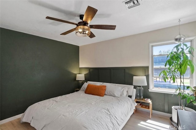 8 Barton Pkwy, Oakdale, CA 95361 - bedroom with wood finished floors and ceiling fan