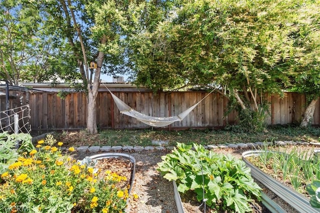 8 Barton Pkwy, Oakdale, CA 95361 - fenced backyard with a garden