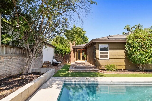 8 Barton Pkwy, Oakdale, CA 95361 - view of pool with a fenced backyard and french doors
